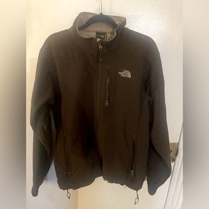 The North Face Men’s Winter jacket. Brown w/ tan fleece lining. Size M.